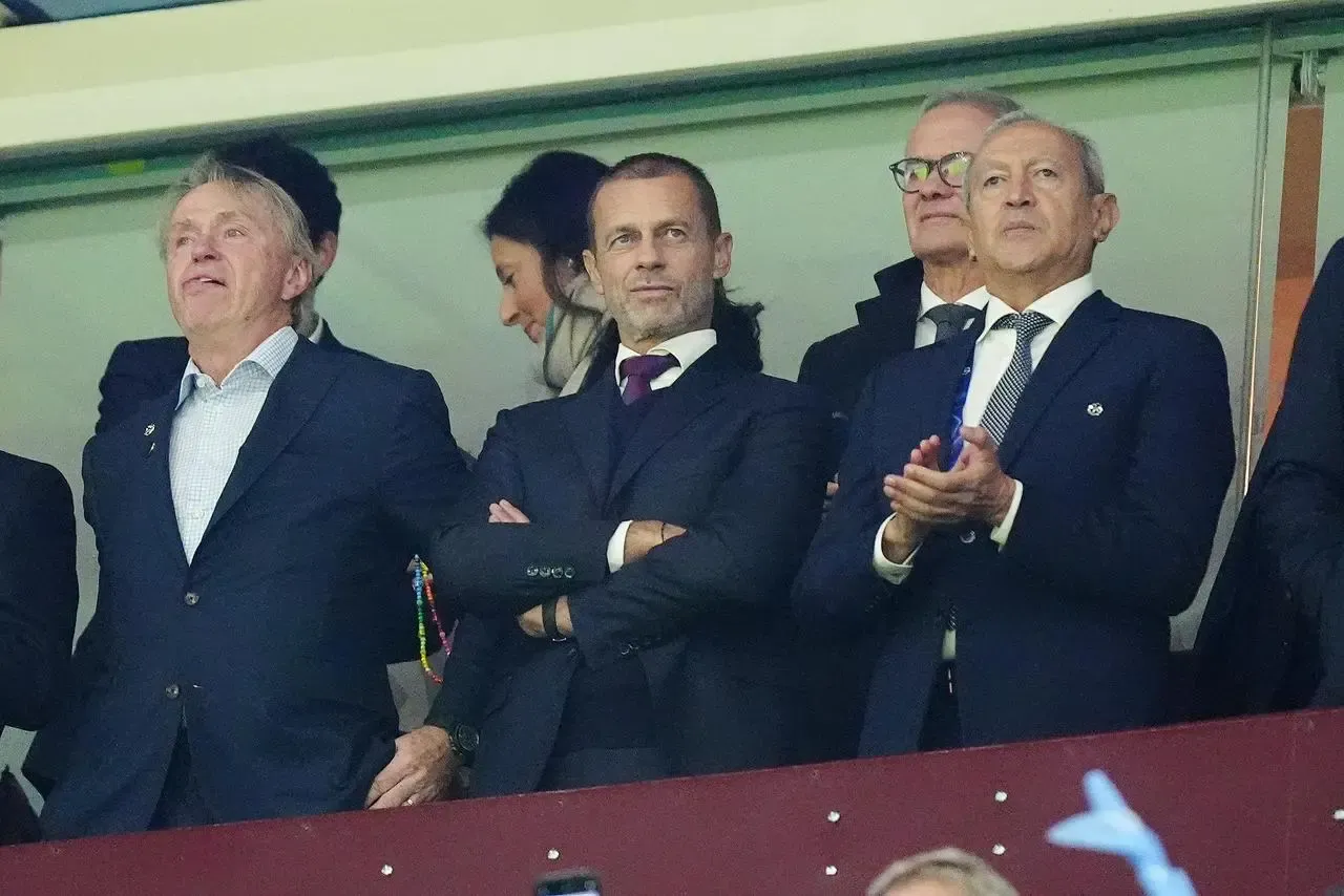 UEFA president Aleksander Ceferin (left) and Aston Villa co-owner Nassef Sawiri