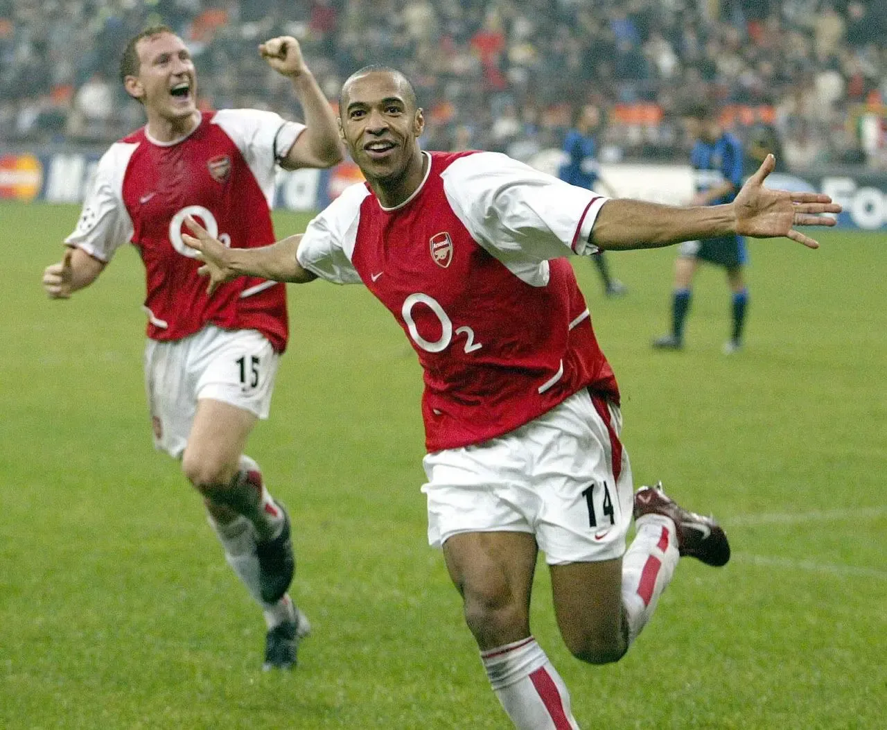 Thierry Henry and Ray Parlour celebrate Arsenal's third goal in their 5-1 win at Inter Milan in 2003