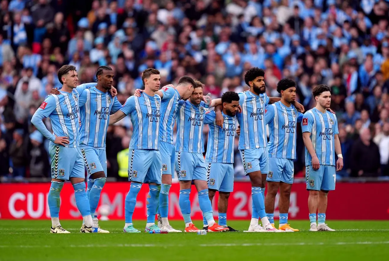 Coventry players during a penalty shoot-out at Wembley