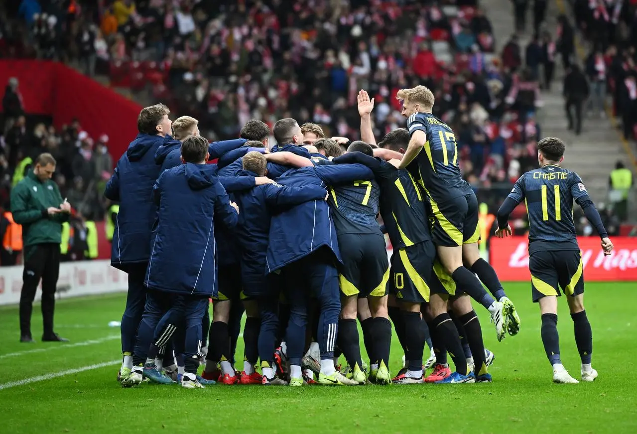 Scotland’s Andrew Robertson celebrates scoring their side’s second goal of the game with players and coaching staff during the UEFA Nations League Group A1 match at the PGE Narodowy stadium, Warsaw.