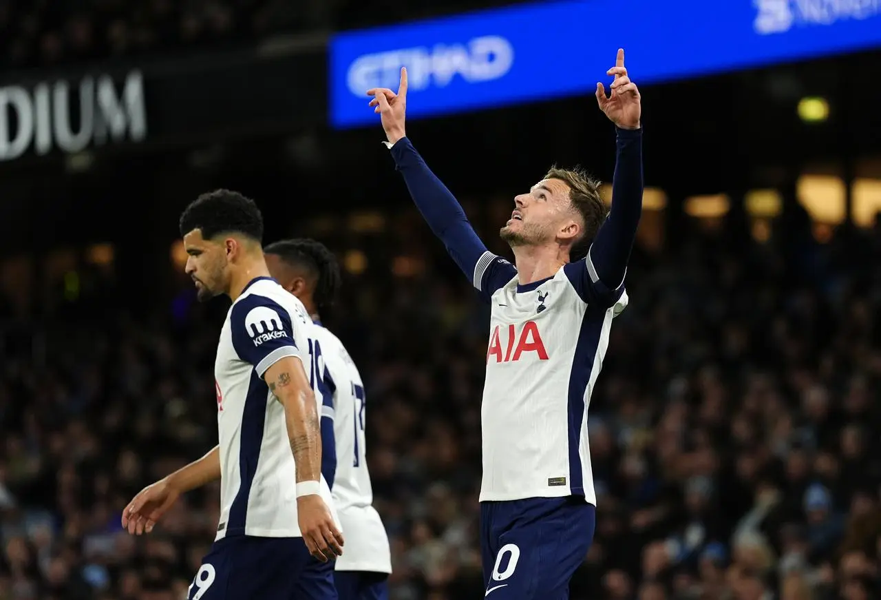 Tottenham’s James Maddison celebrates scoring at Manchester City