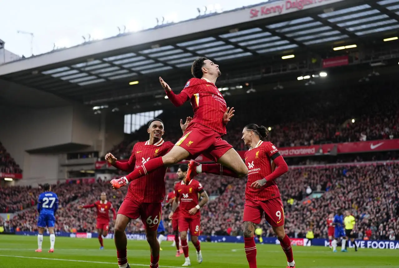 Curtis Jones celebrates