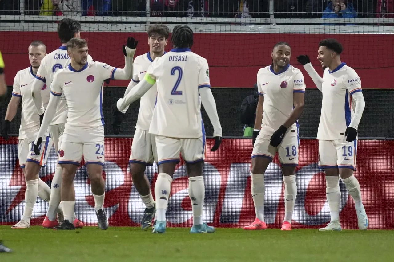 Christopher Nkunku, second from right, celebrates with team-mates after scoring his Chelsea's opening goal