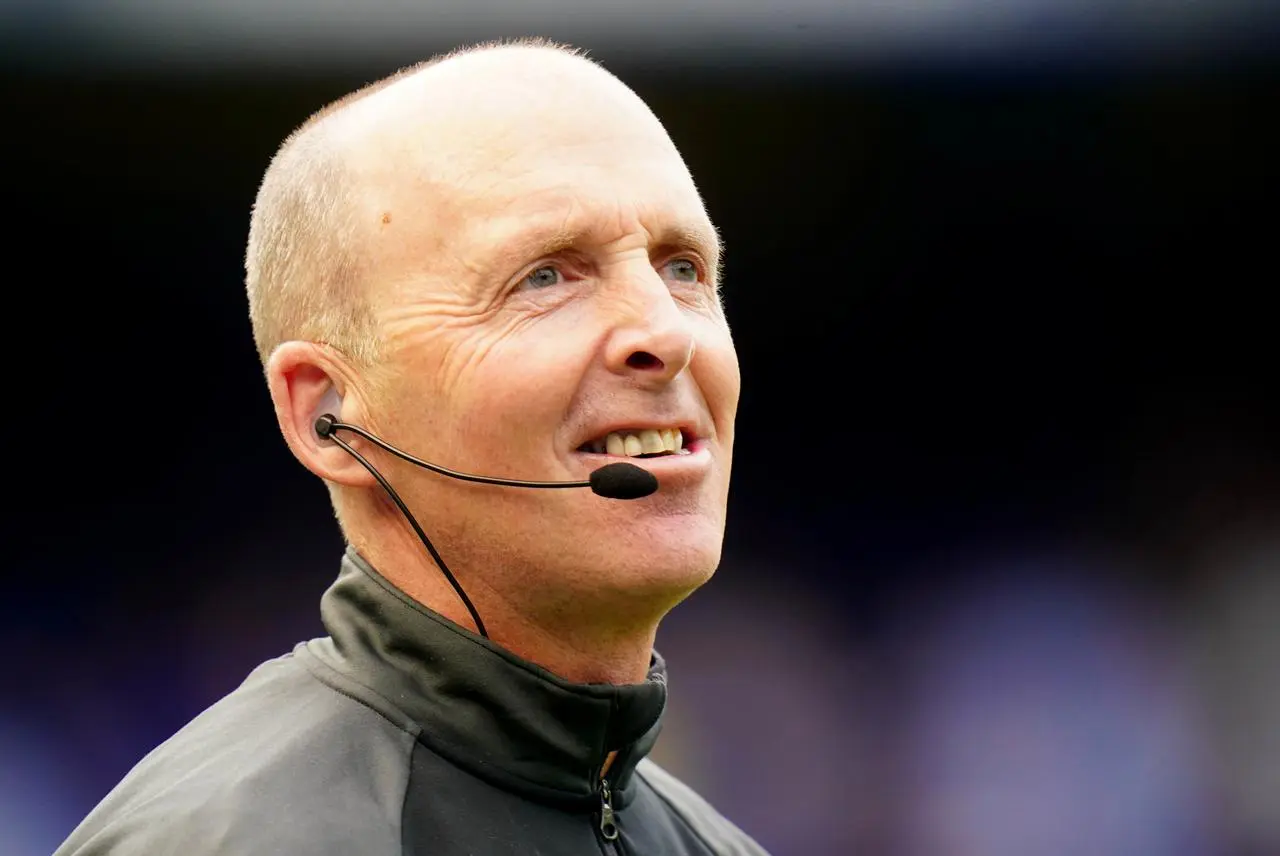 Referee Mike Dean before the Premier League match at Stamford Bridge, London.