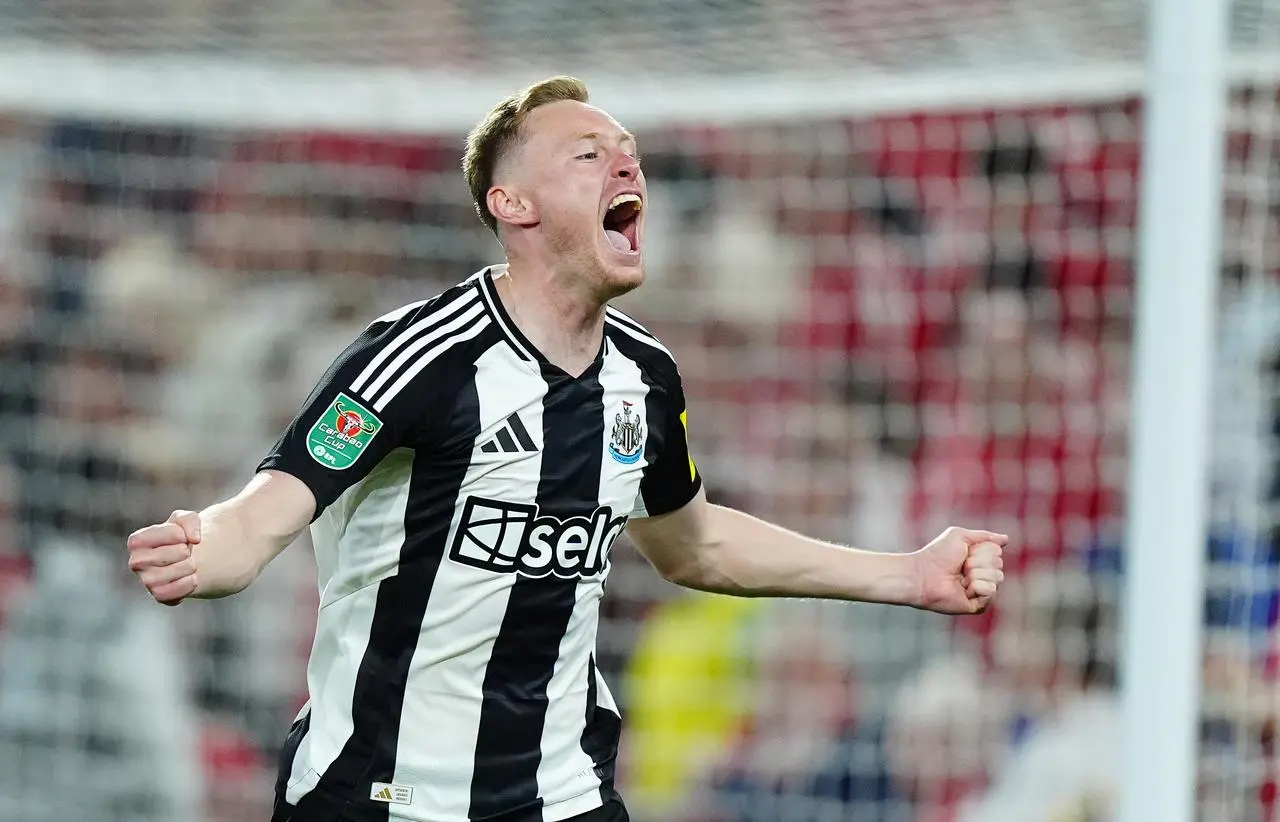 Sean Longstaff celebrates a goal