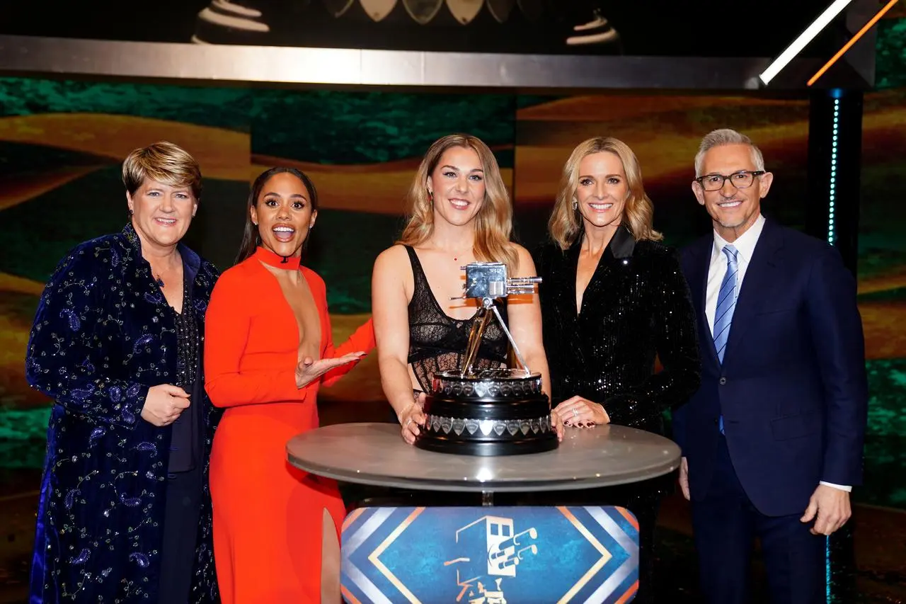 Personality of the Year alongside presenters Clare Balding (left), Alex Scott (second left), Gabby Logan (second right) and Gary Lineker (right) during the 2023 BBC Sports Personality of the Year Awards held at MediaCityUK, Salford