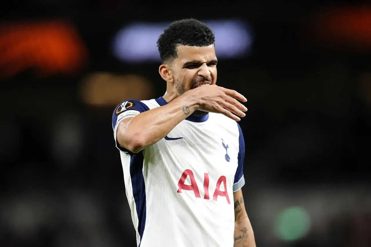 Tottenham striker Dominic Solanke bites his hand