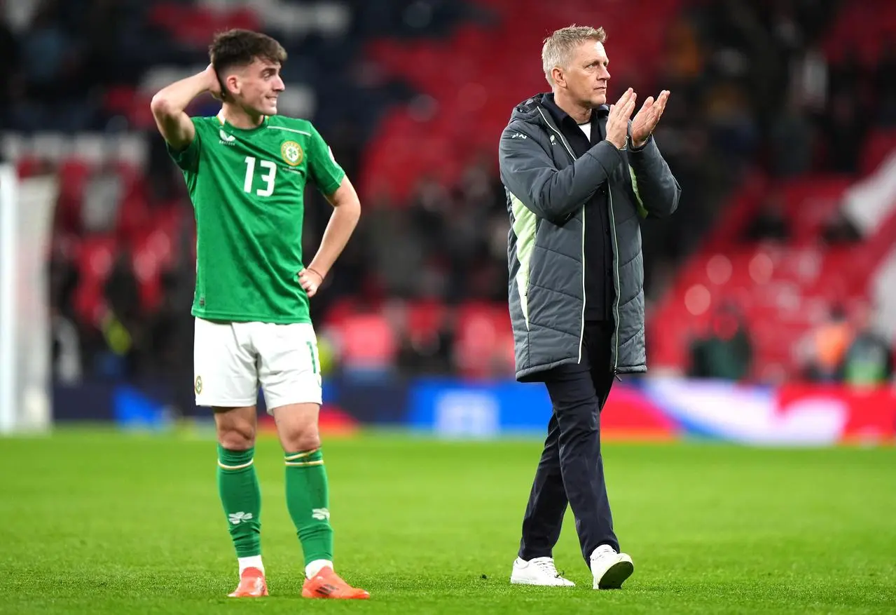 Heimir Hallgrimsson claps the Republic of Ireland fans