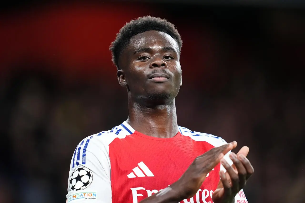 Bukayo Saka applauds fans