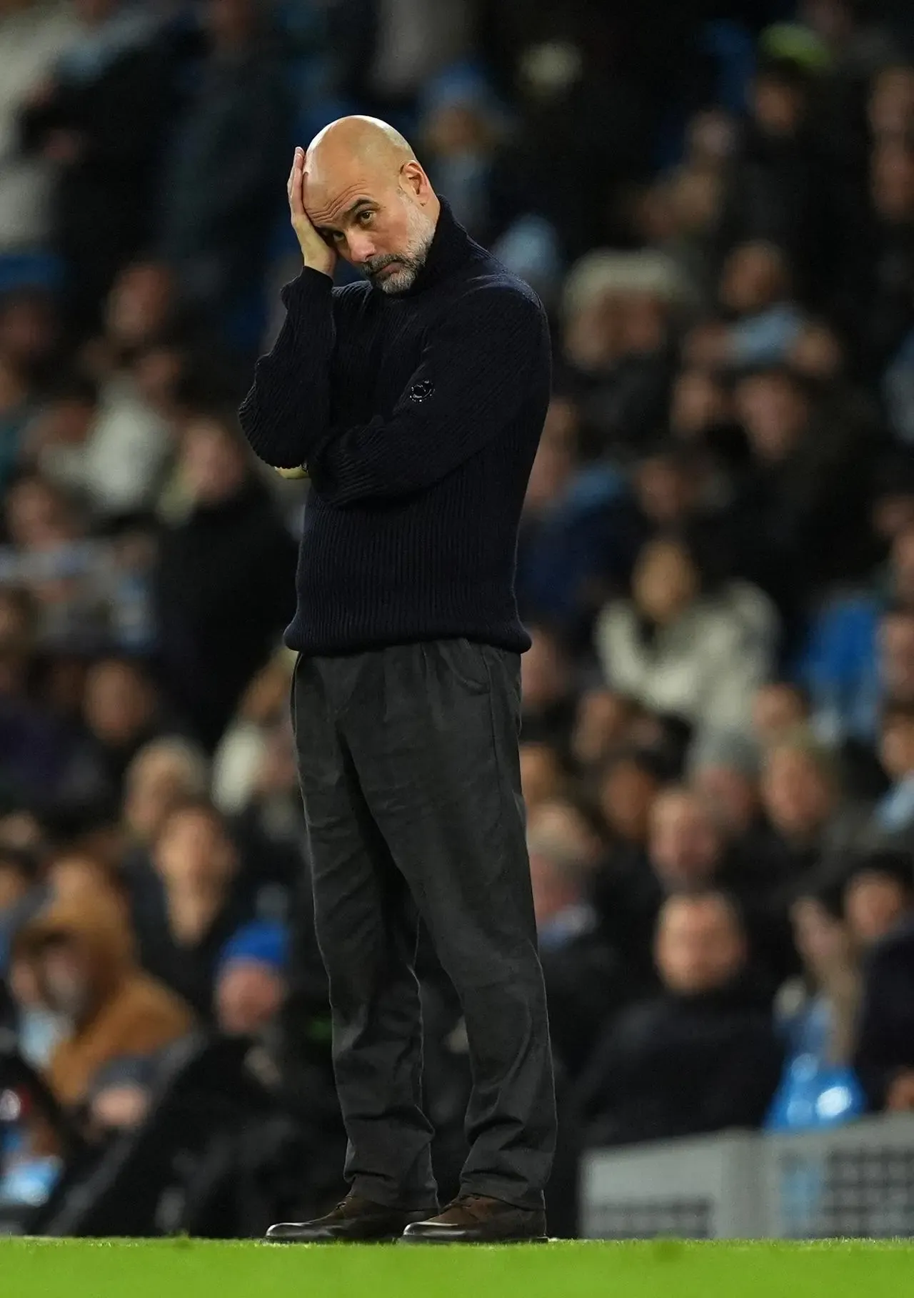 Pep Guardiola on the touchline