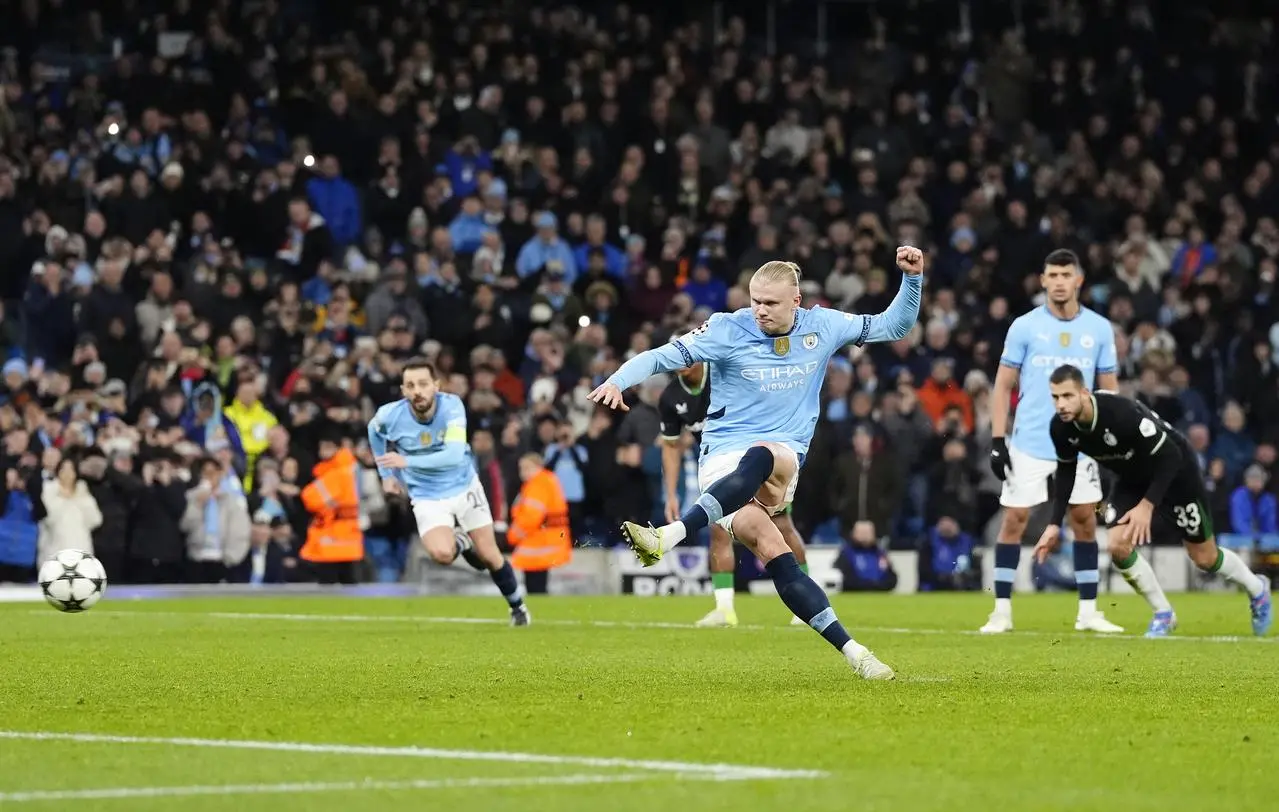 Erling Haaland scores Manchester City’s first goal against Feyenoord from a penalty