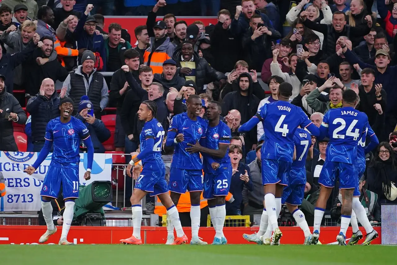 Nicolas Jackson, centre, celebrates with his Chelsea team-mates after scoring against Liverpool