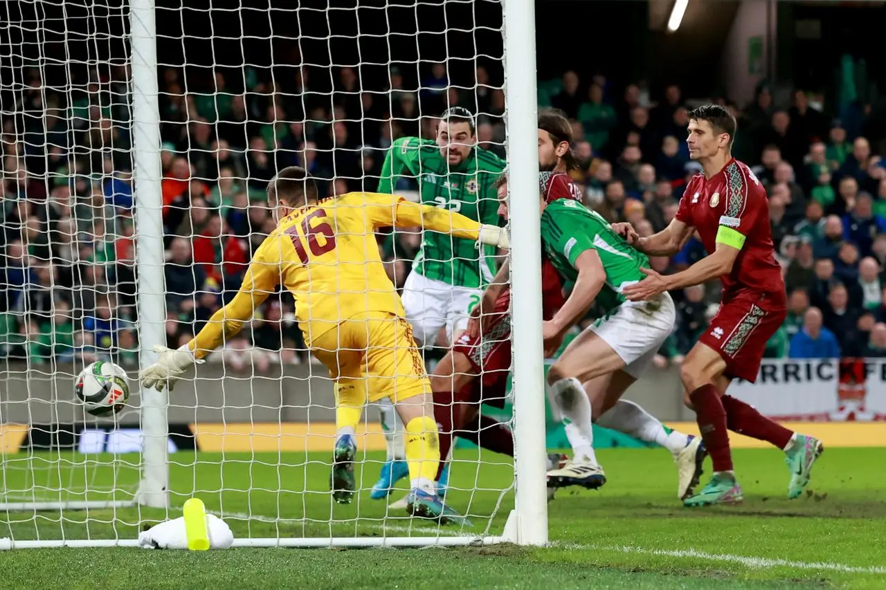 Daniel Ballard turns the ball home at the far post as he scores Northern Ireland's opener 