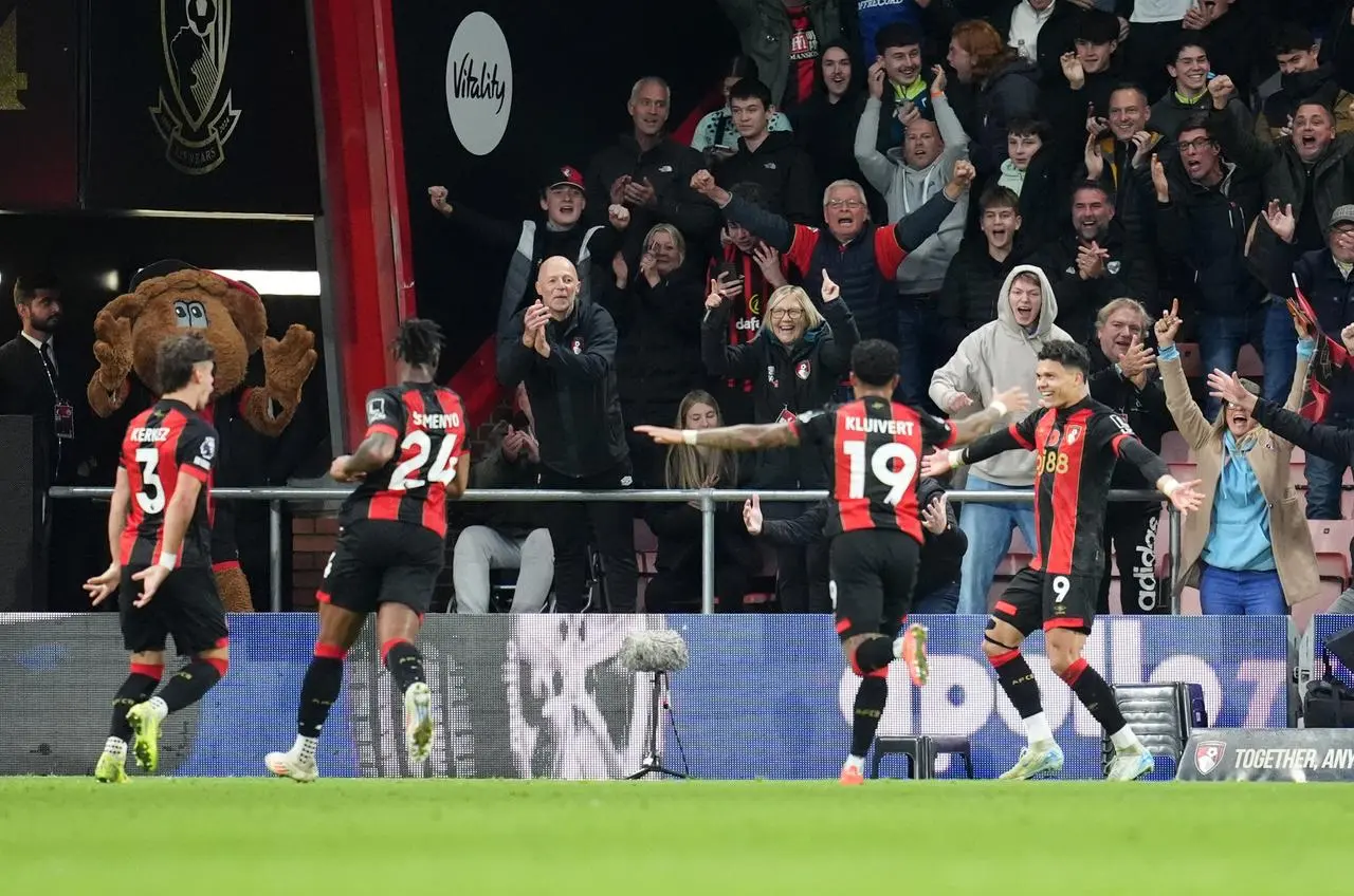 Evanilson, right, celebrates his goal