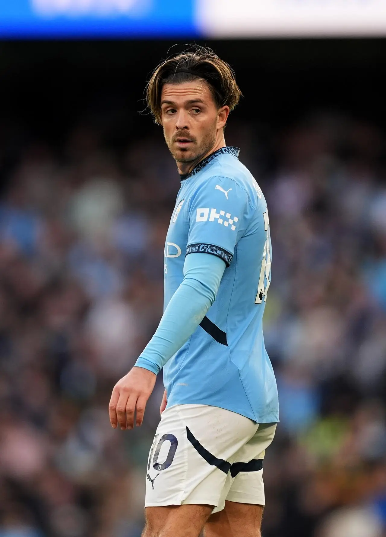 Manchester City's Jack Grealish looks over his shoulder during a game