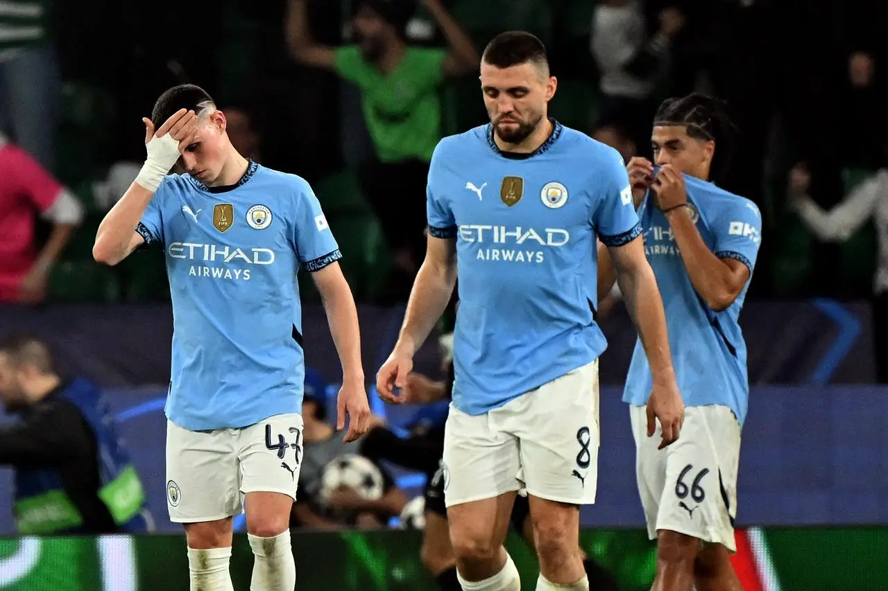 Phil Foden and Mateo Kovacic show their frustration during Manchester City's defeat in Lisbon