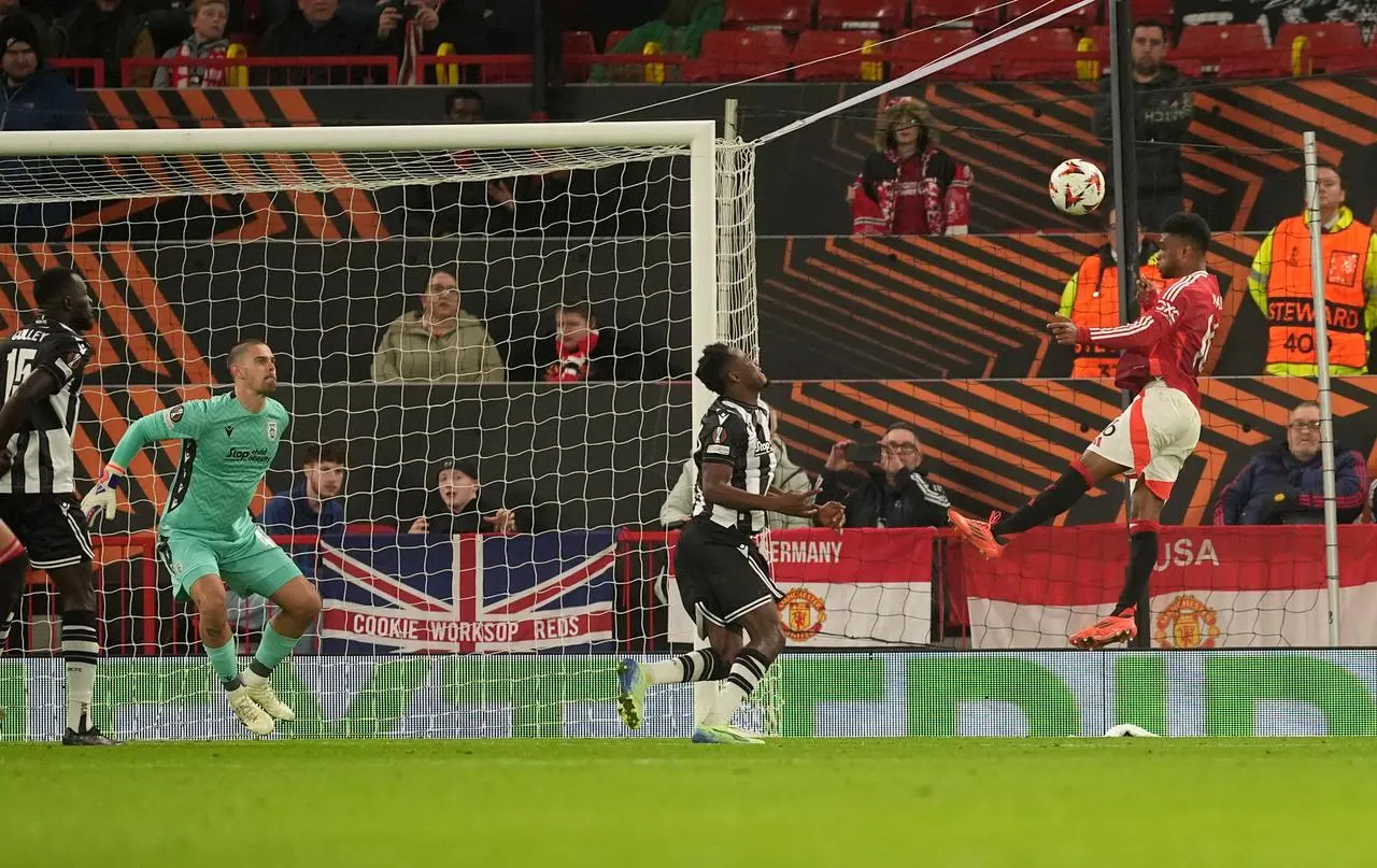 Amad Diallo heads home the opening goal for Manchester United