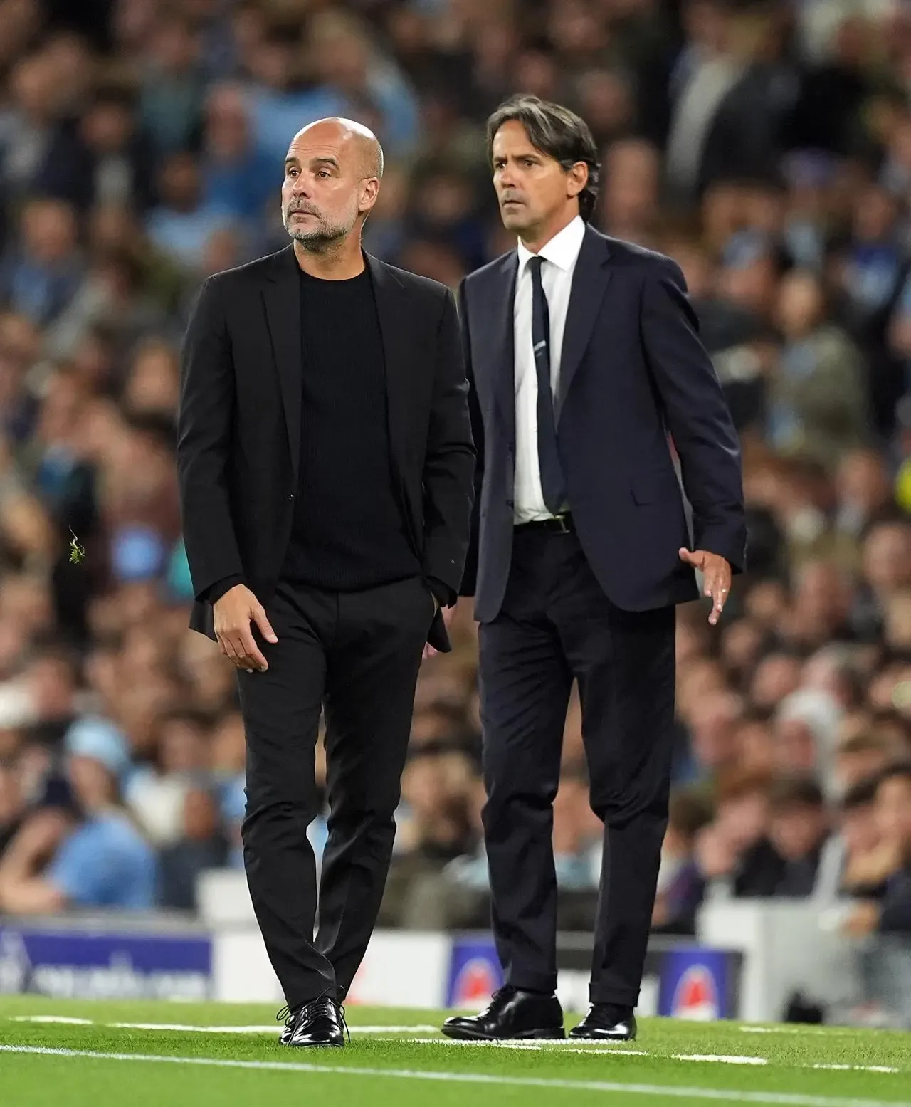 Manchester City manager Pep Guardiola, left, and Inter Milan manager Simone Inzaghi on the touchline during September's Champions League match at the Etihad Stadium