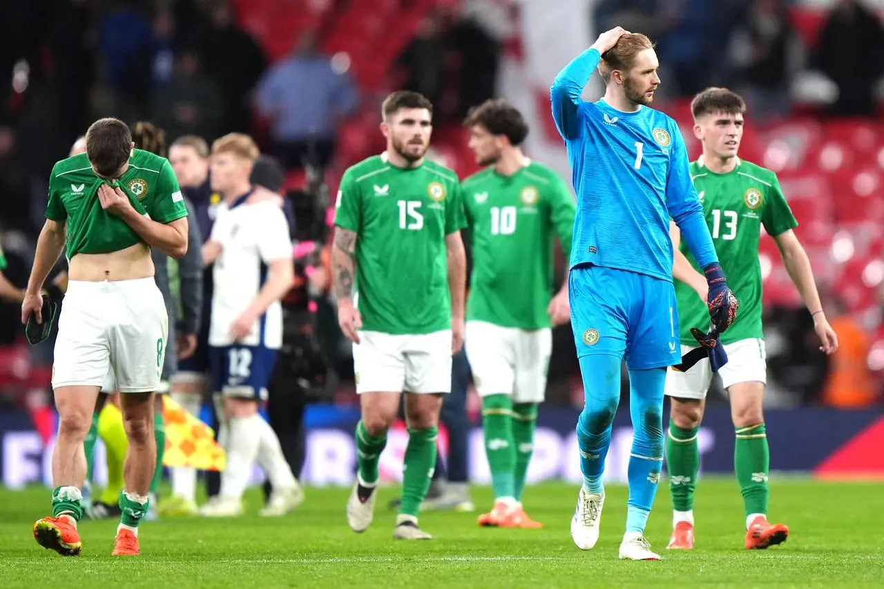 Republic of Ireland players looking dejected after defeat