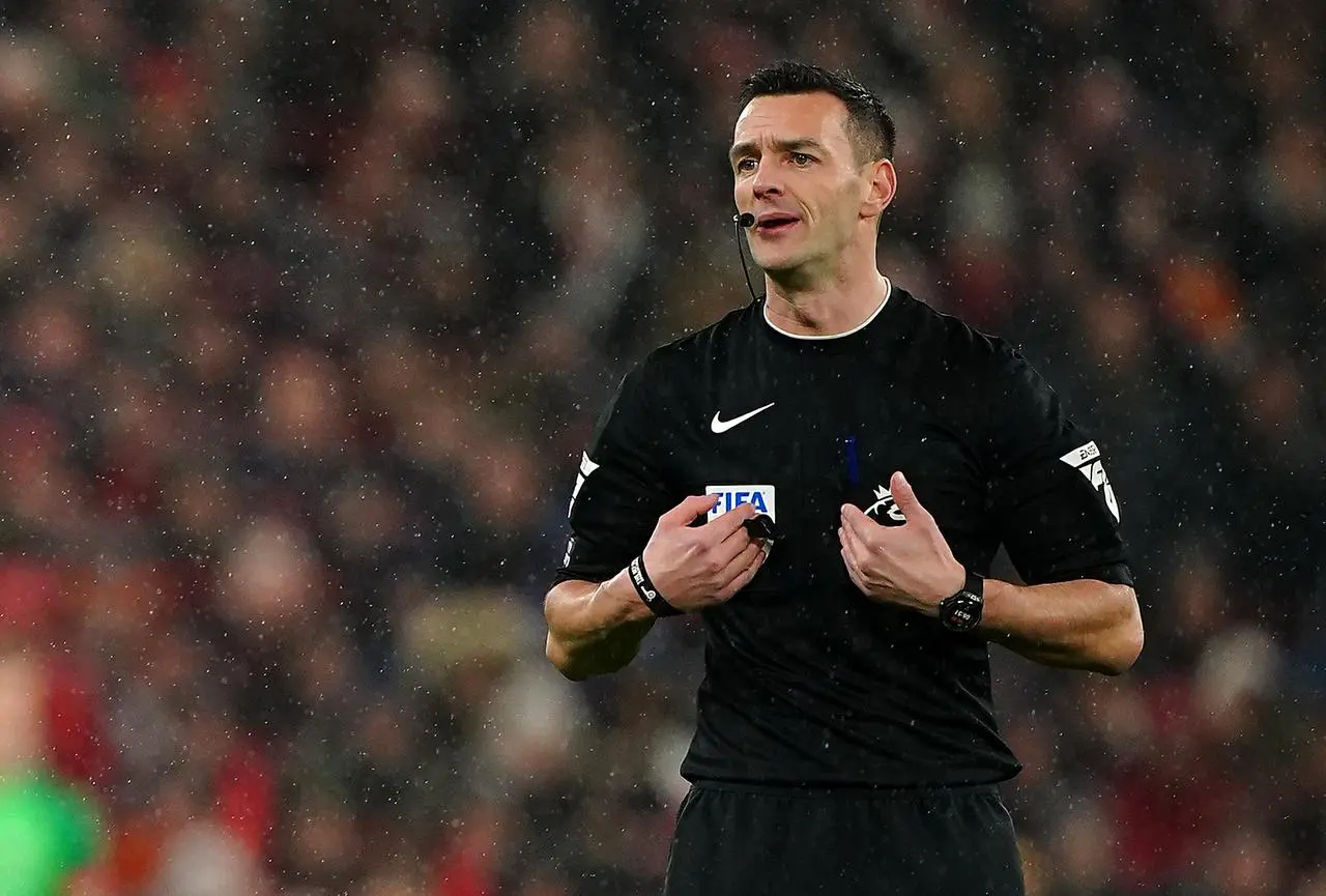 Referee Andy Madley in action