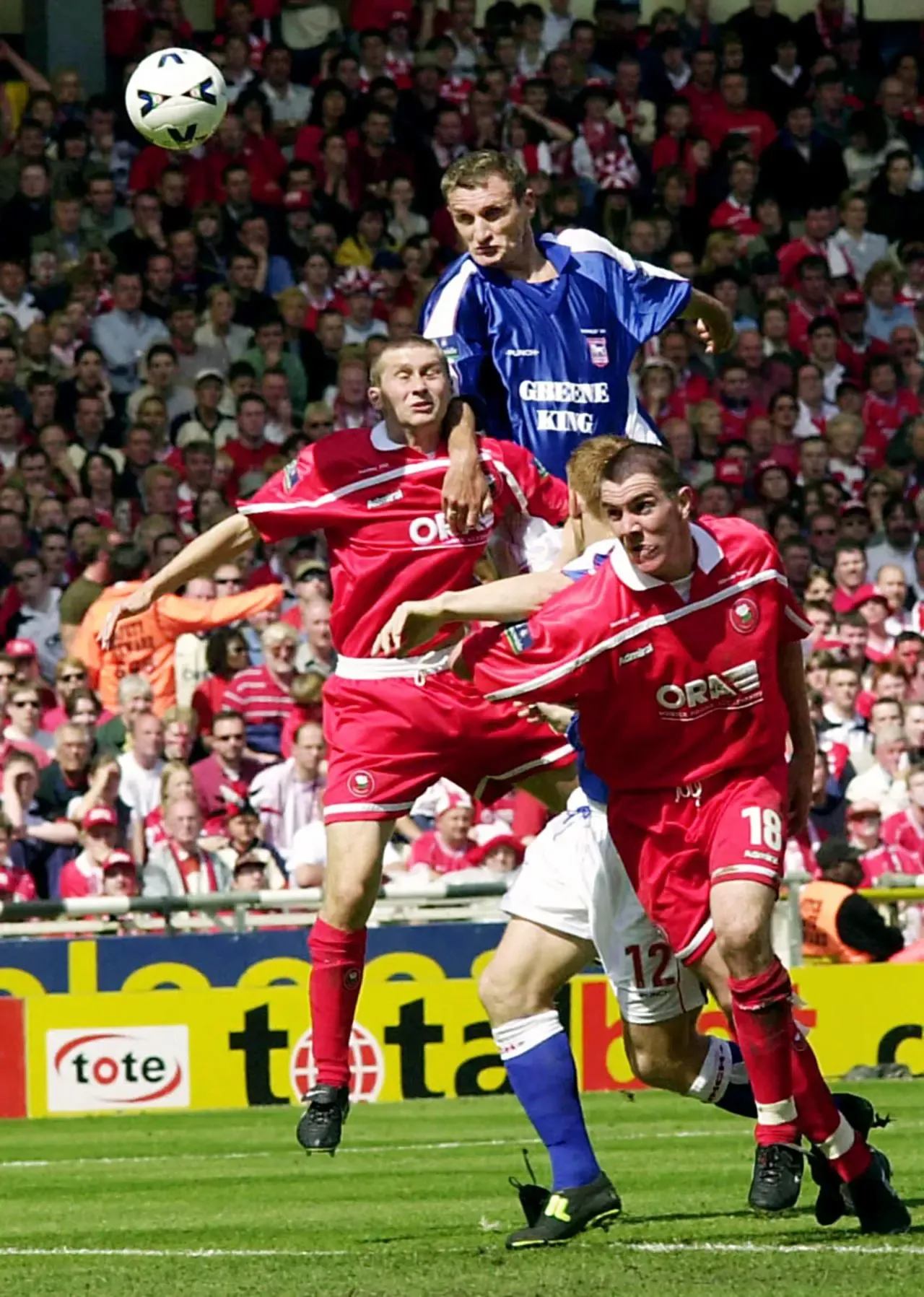 Ipswich's Tony Mowbray (top) scores with a header against Barnsley during the Division 1 play-off final at Wembley