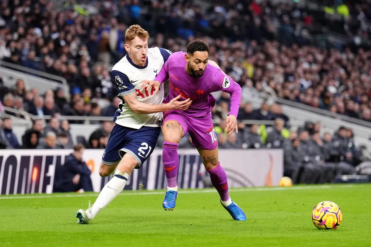 Tottenham Hotspur’s Dejan Kulusevski (left) and Wolverhampton Wanderers’ Matheus Cunha battle for the ball 