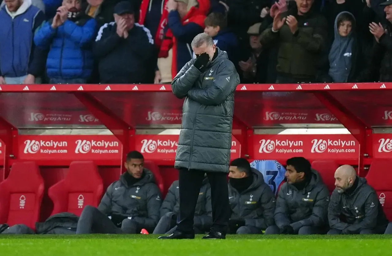 Ange Postecoglou puts his hand over his eyes on the touchline