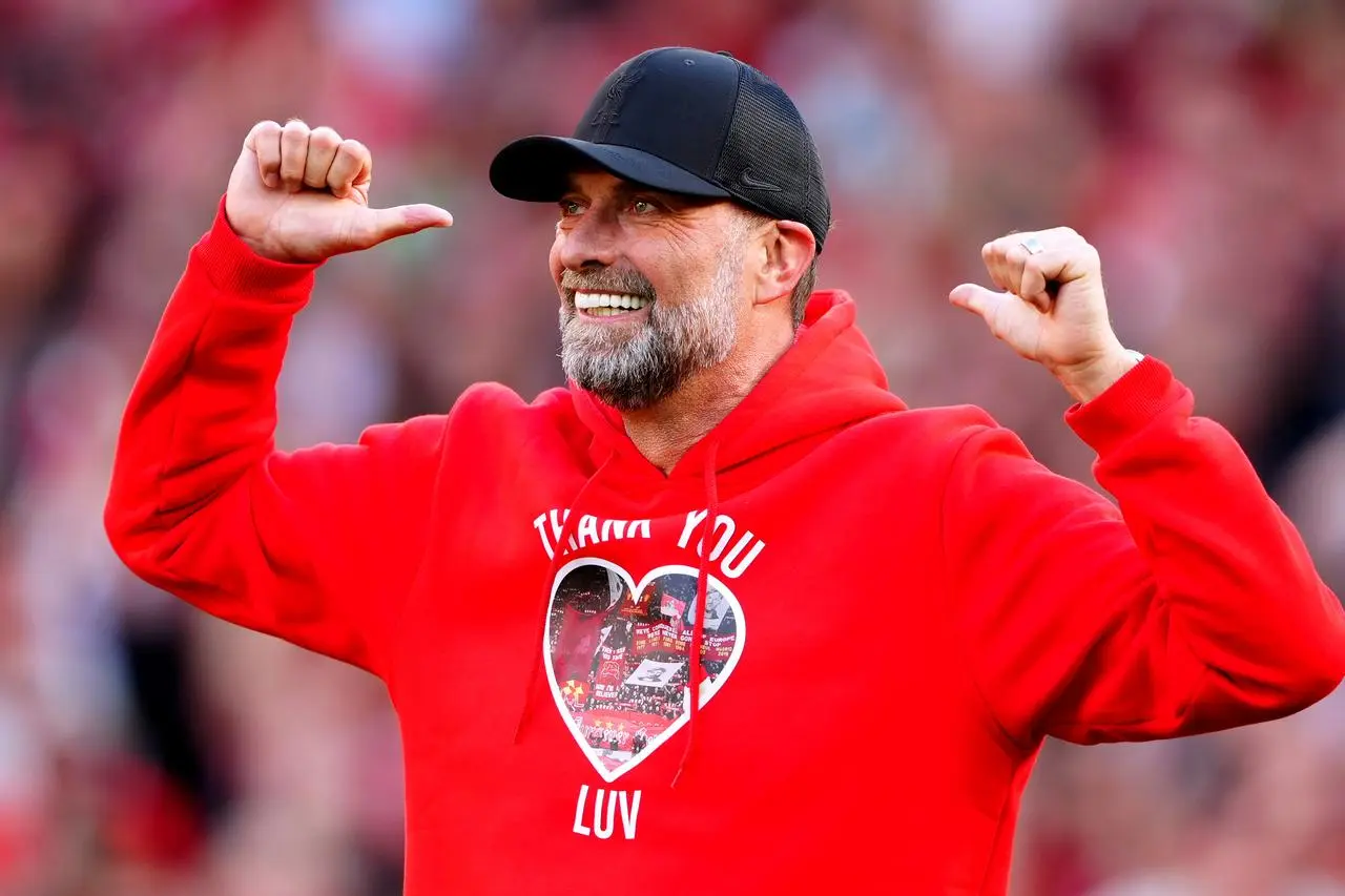 Jurgen Klopp gives the thumbs up to the Liverpool supporters after his final match as the club's manager