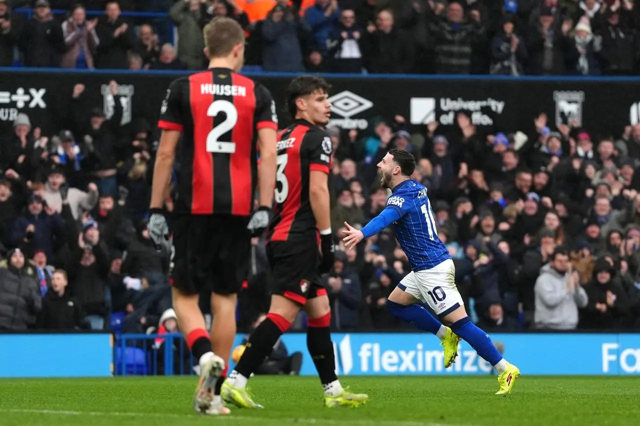 Conor Chaplin, right, wheels away in celebration after putting Ipswich ahead against Bournemouth