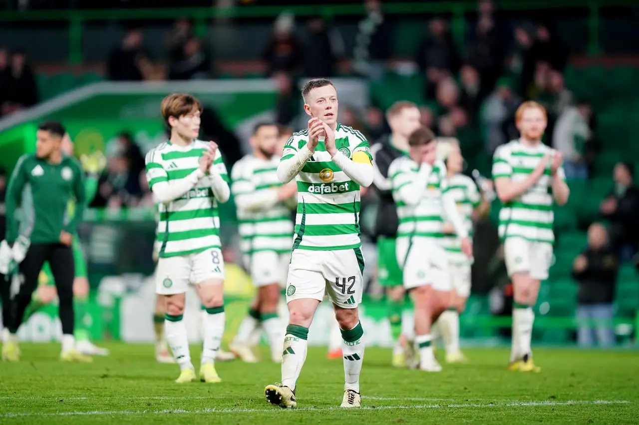 Celtic’s Callum McGregor leads his team-mates in applauding the fans