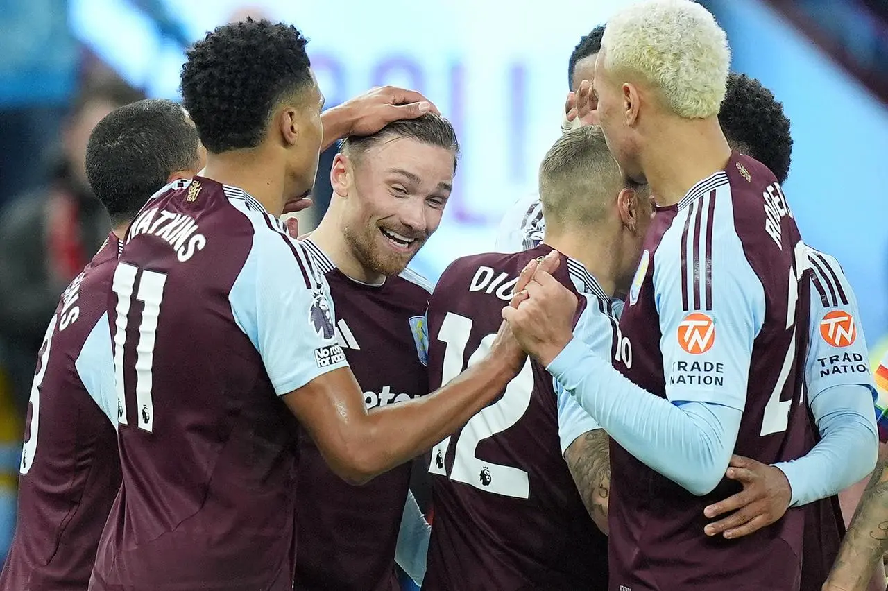 Aston Villa’s Matty Cash celebrates scoring against Brentford with his team-mates