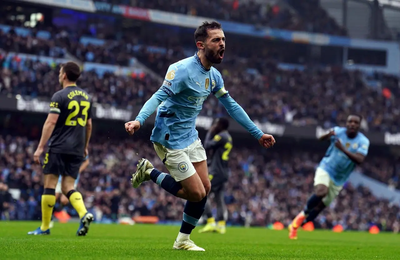 Bernardo Silva celebrates scoring the opening goal 