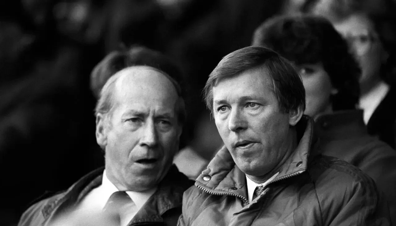 Sir Alex Ferguson alongside former Manchester United forward Sir Bobby Charlton, left, early in his reign