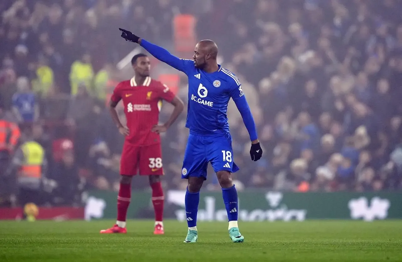 Jordan Ayew celebrates after putting Leicester in front against Liverpool