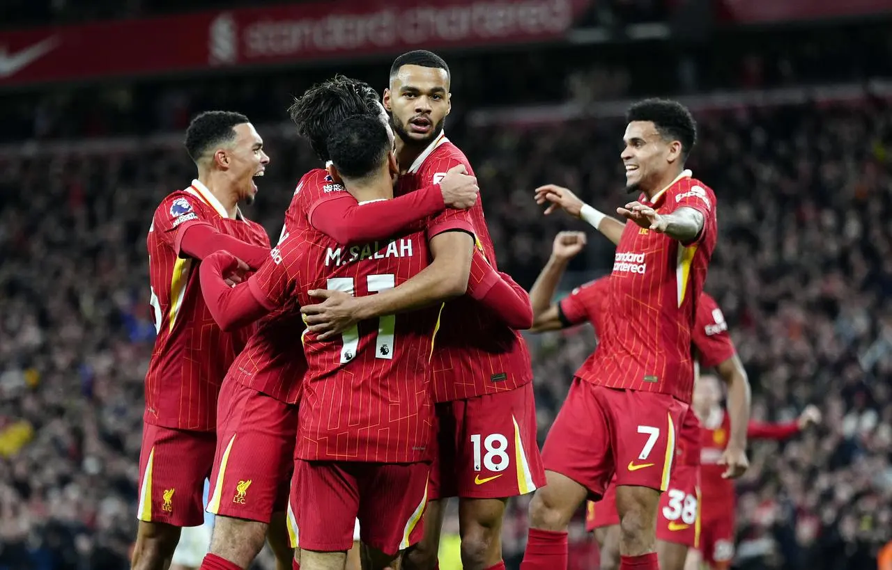 Cody Gakpo celebrates scoring Liverpool's first goal