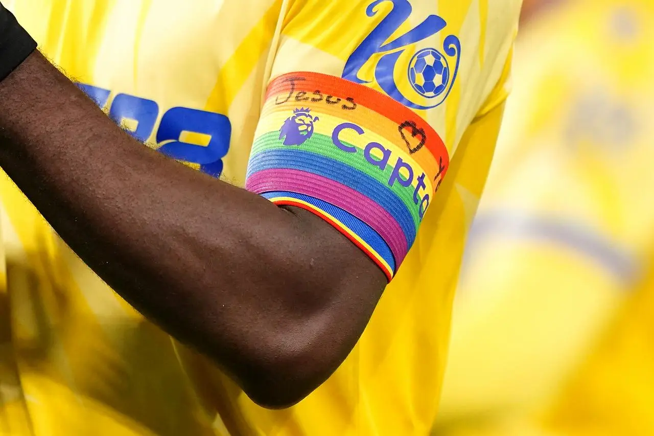 Close up of Crystal Palace’s Marc Guehi wearing the adapted rainbow armband against Ipswich