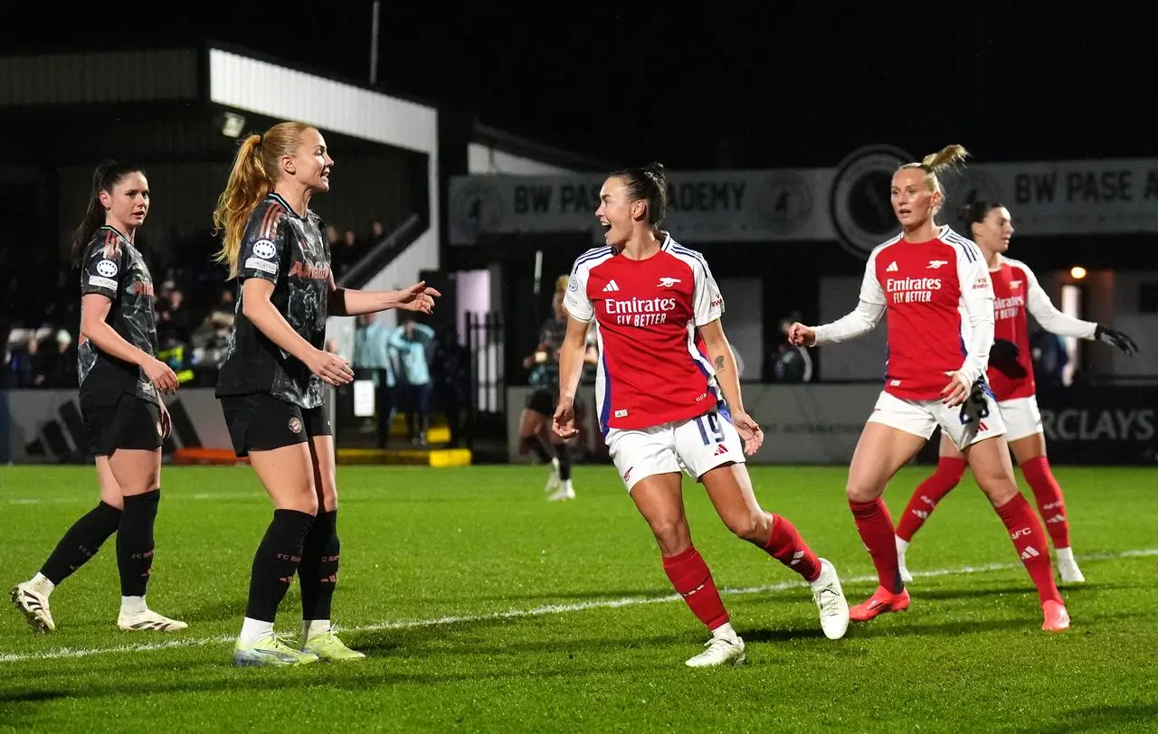 Caitlin Foord, centre, celebrates Arsenal's first goal