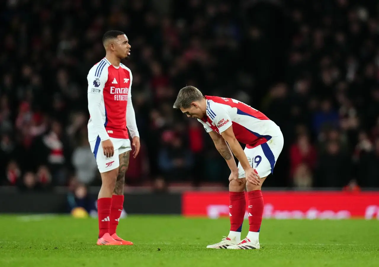 Gabriel Jesus and Leandro Trossard stand dejected