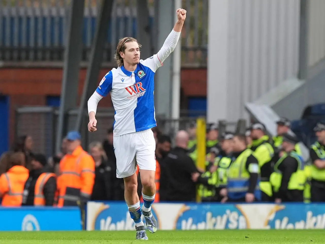 Todd Cantwell raises his hand in celebration