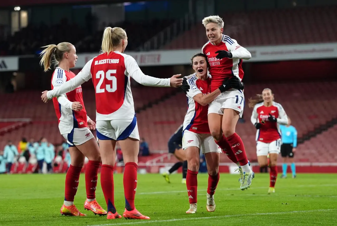 Arsenal players celebrating a goal