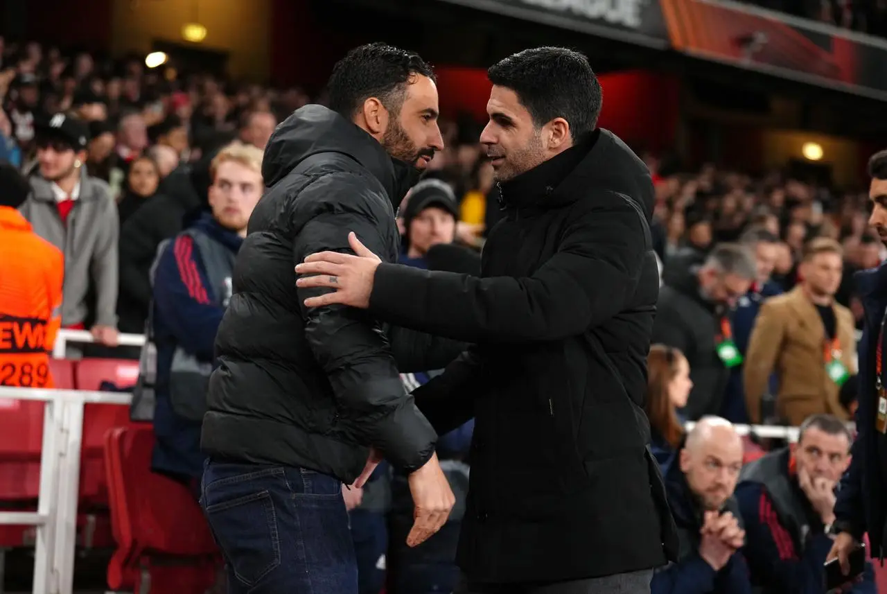 Ruben Amorim, left, greets Mikel Arteta before Sporting Lisbon's Europa League clash with Arsenal in 2023