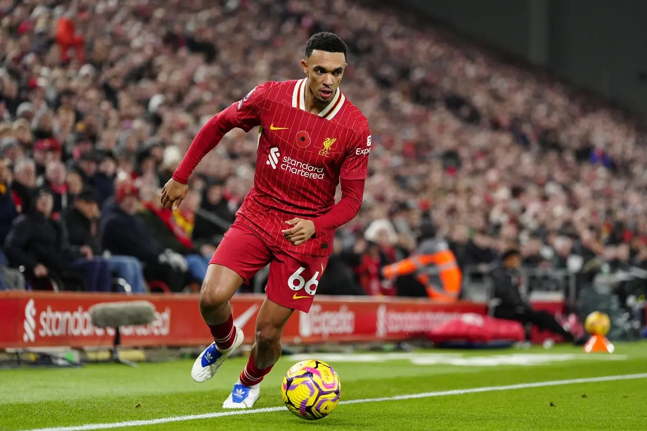 Liverpool’s Trent Alexander-Arnold runs with the ball