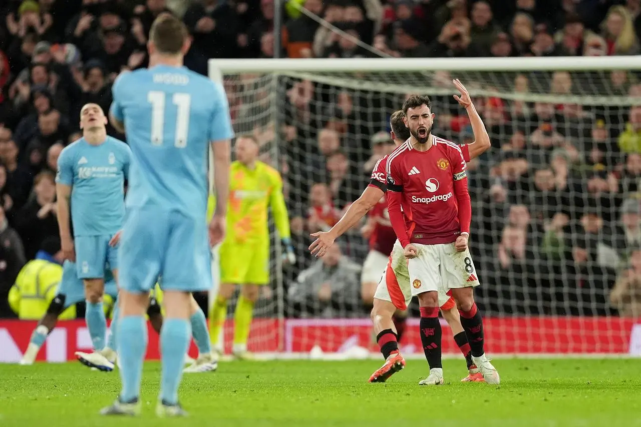 Bruno Fernandes clenches both fists to celebrate scoring