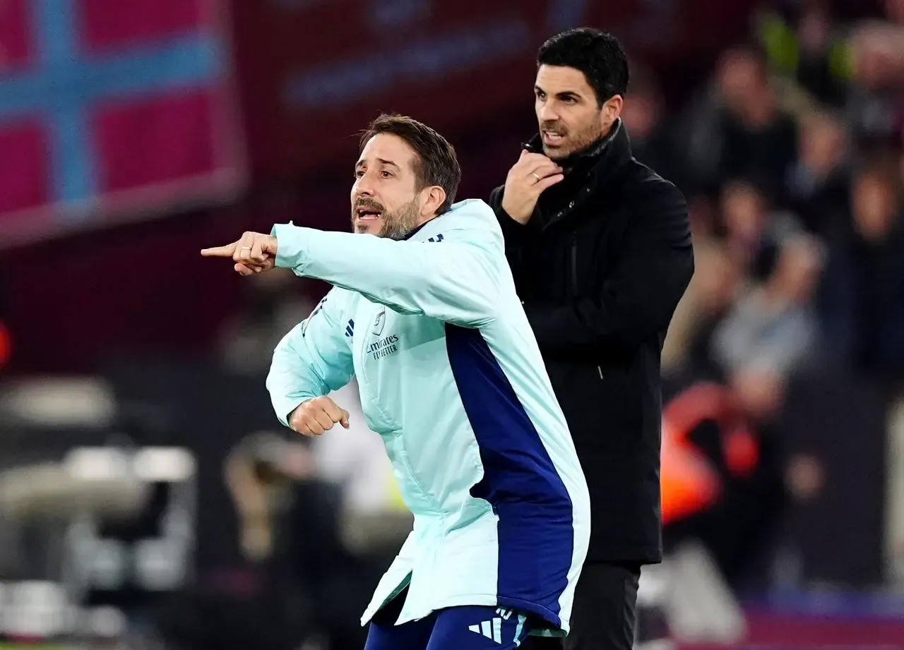 Arsenal set-piece coach Nicolas Jover (left) stands on the touchline with Mikel Arteta