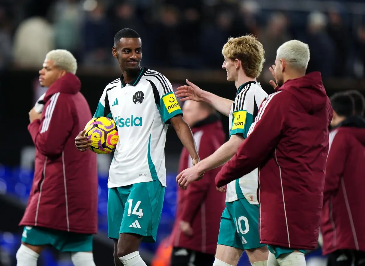 Newcastle’s Alexander Isak leaves with the match ball after scoring a hat-trick in a 4-0 Premier League win at Ipswich