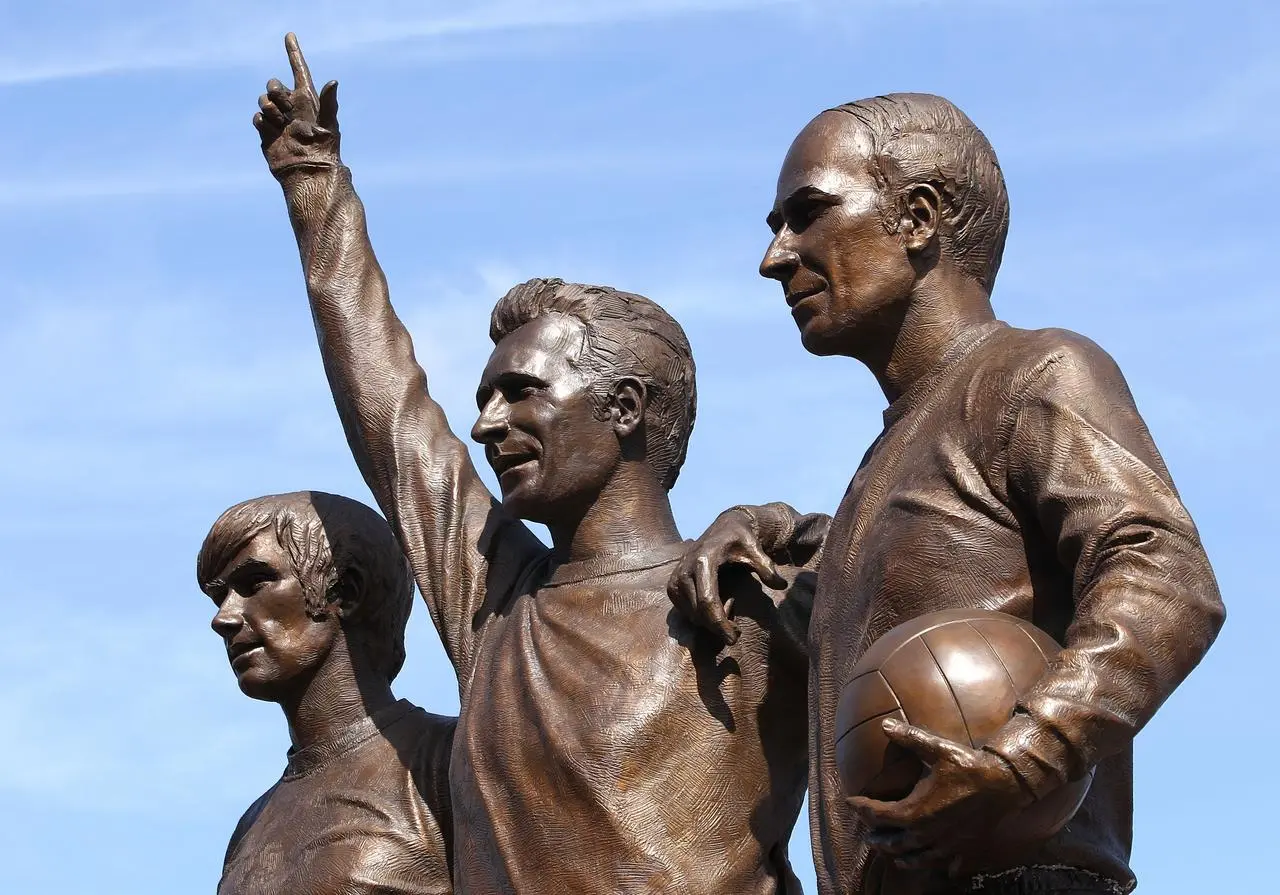 The United Trinity statue of former players (left to right) George Best, Denis Law and Bobby Charlton outside Old Trafford