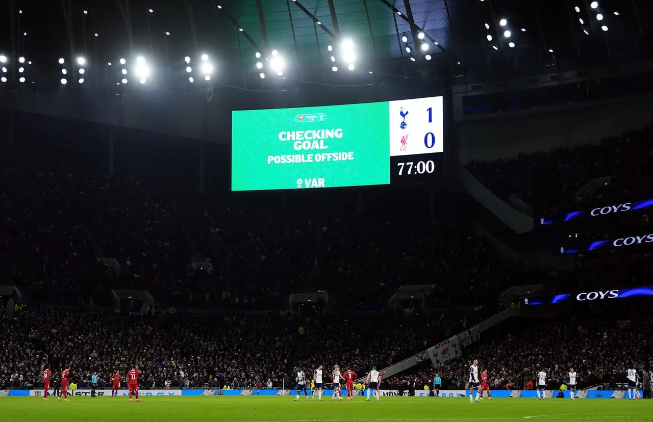 Referee Stuart Attwell waits on the VAR decision before they rule out the goal by Dominic Solanke for an offside 