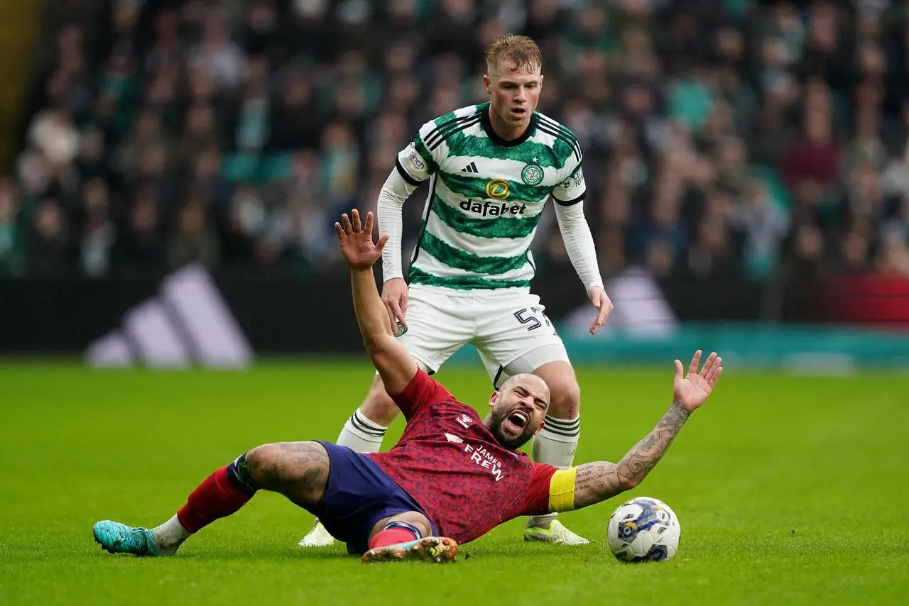 Stephen Welsh challenges for the ball