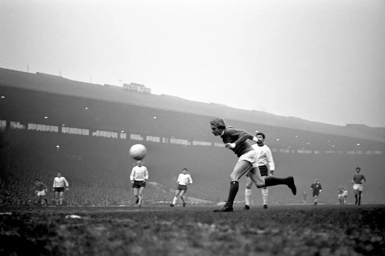 Denis Law heads the goal that gave Manchester United their 1-0 victory over League leaders Liverpool at Old Trafford