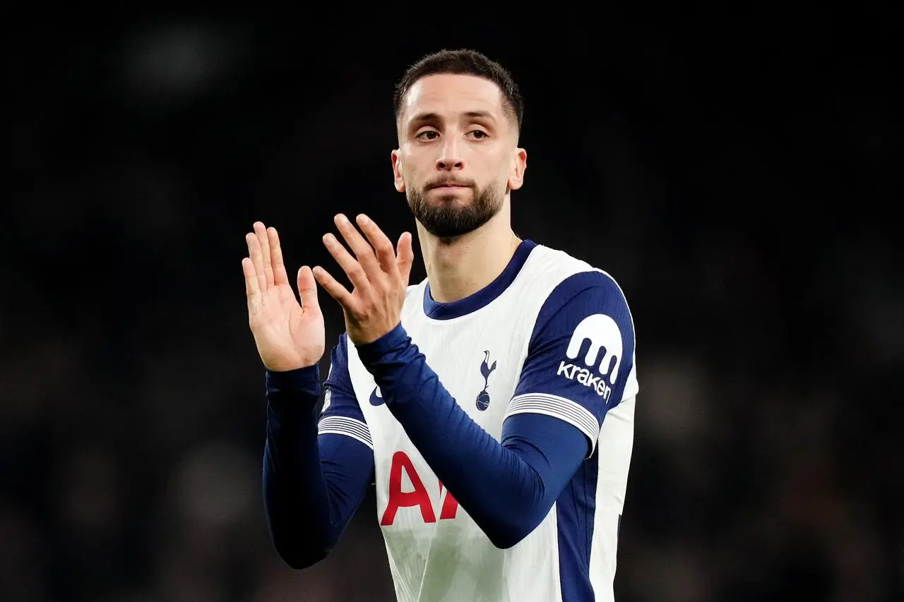 Tottenham Hotspur’s Rodrigo Bentancur applauds the fans 